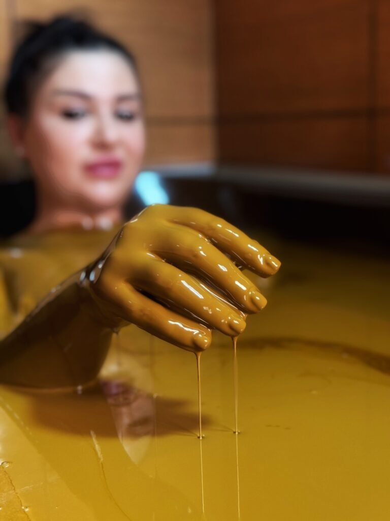 girl is taking oil bath